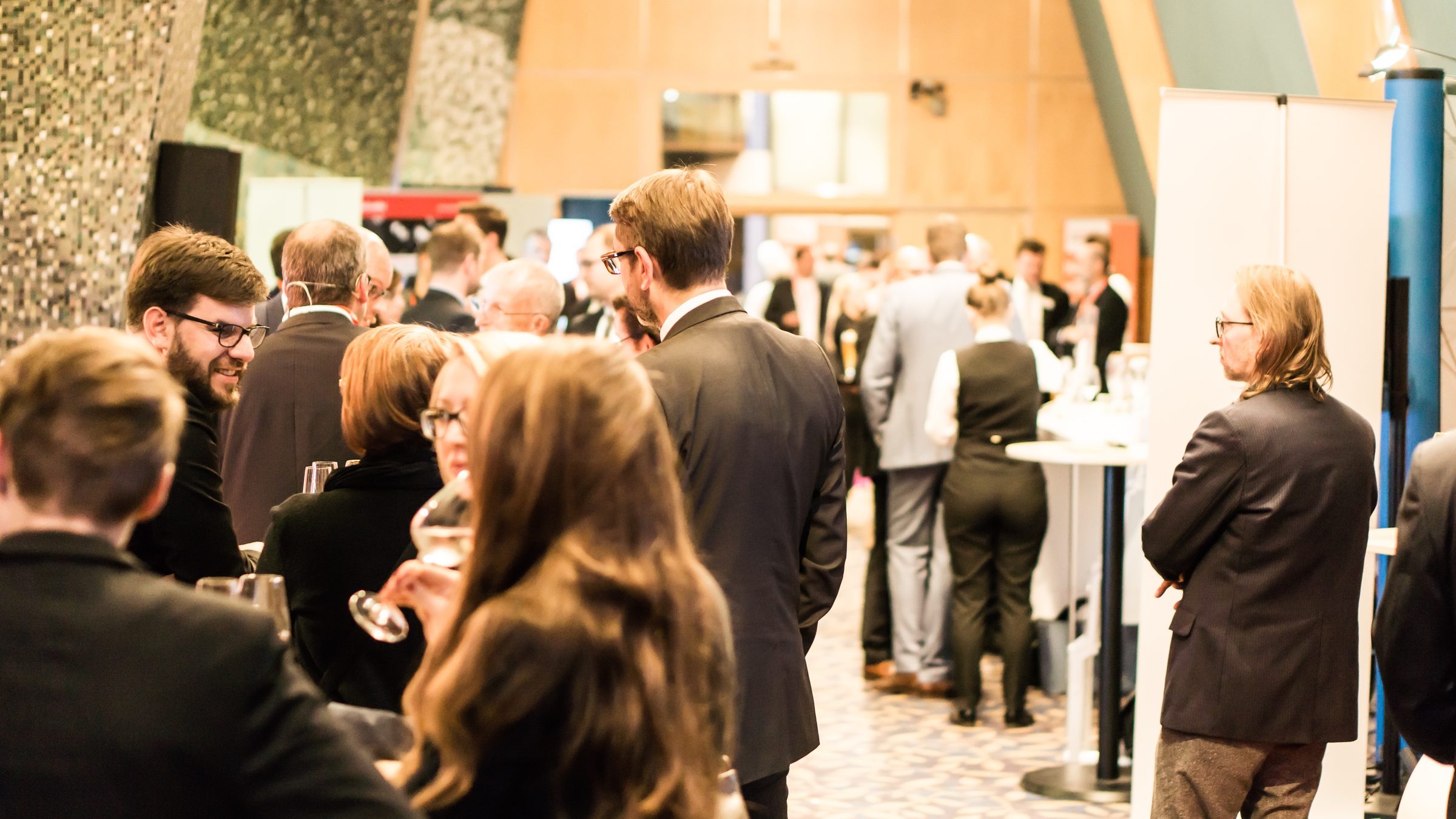 Large convention with guests networking and socializing
